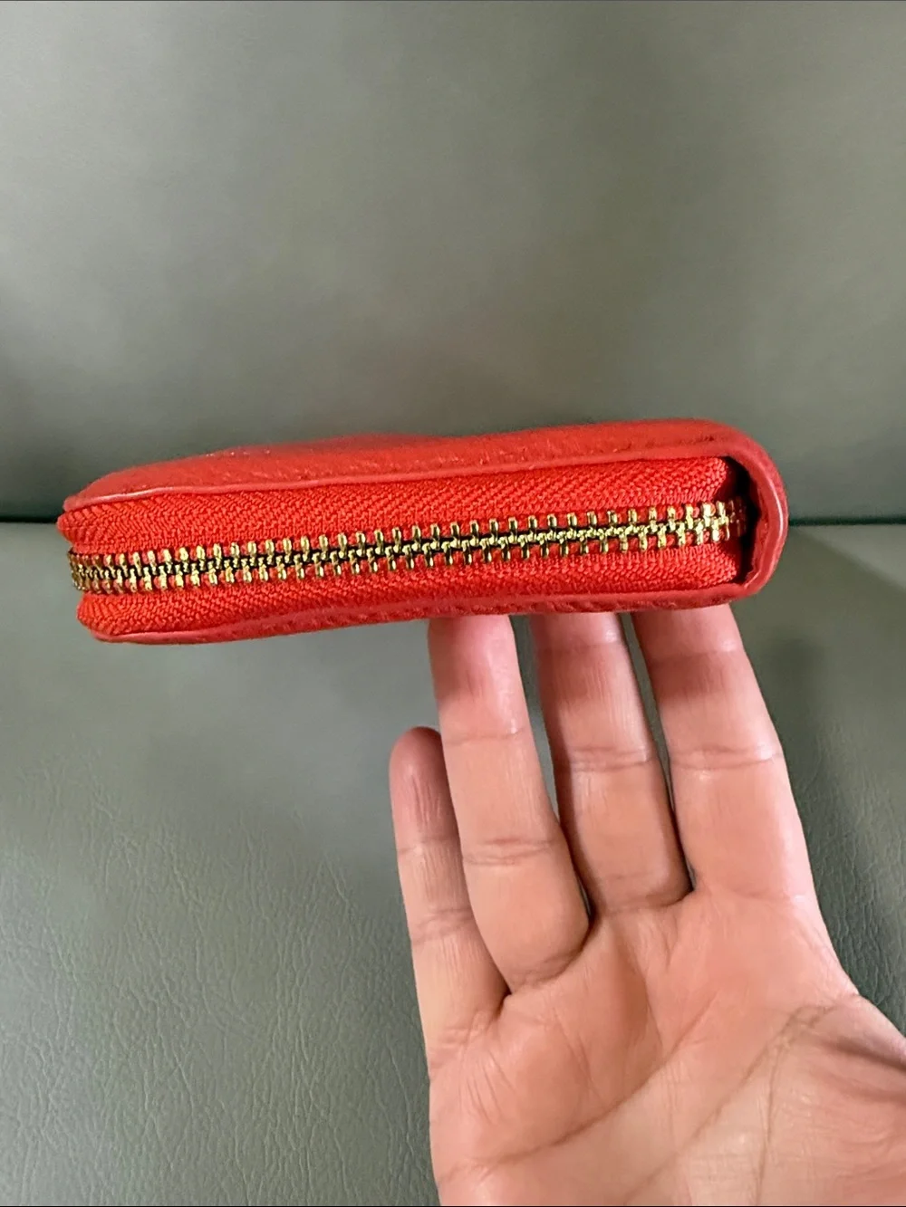 Tory Burch orange Pebbled Leather Zip Wallet with Gold Logo